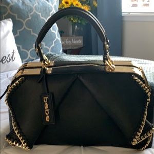 Gorgeous black purse with lots of gold accents